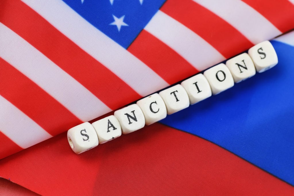 russian and usa flag sanctions