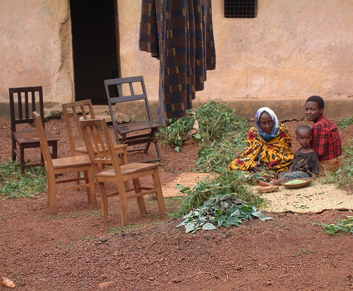 She sat in front of her quite large and well-built house when we came by... Muramvia, Burundi © 2007 Jan Oberg, TFF