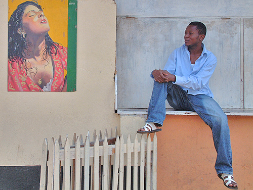 Young man with paintingon the wall. Bujumbura, Burundi # 4 © 2006 Jan Oberg, TFF