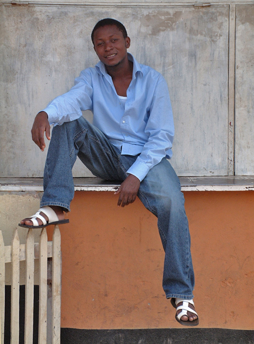 Young man posing in the street. Bujumbura, Burundi # 3 © 2006 Jan Oberg, TFF