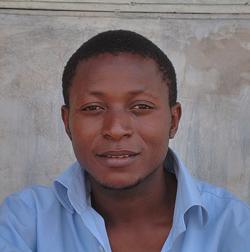Young man posing in the street. Bujumbura, Burundi # 1 © 2006 Jan Oberg, TFF